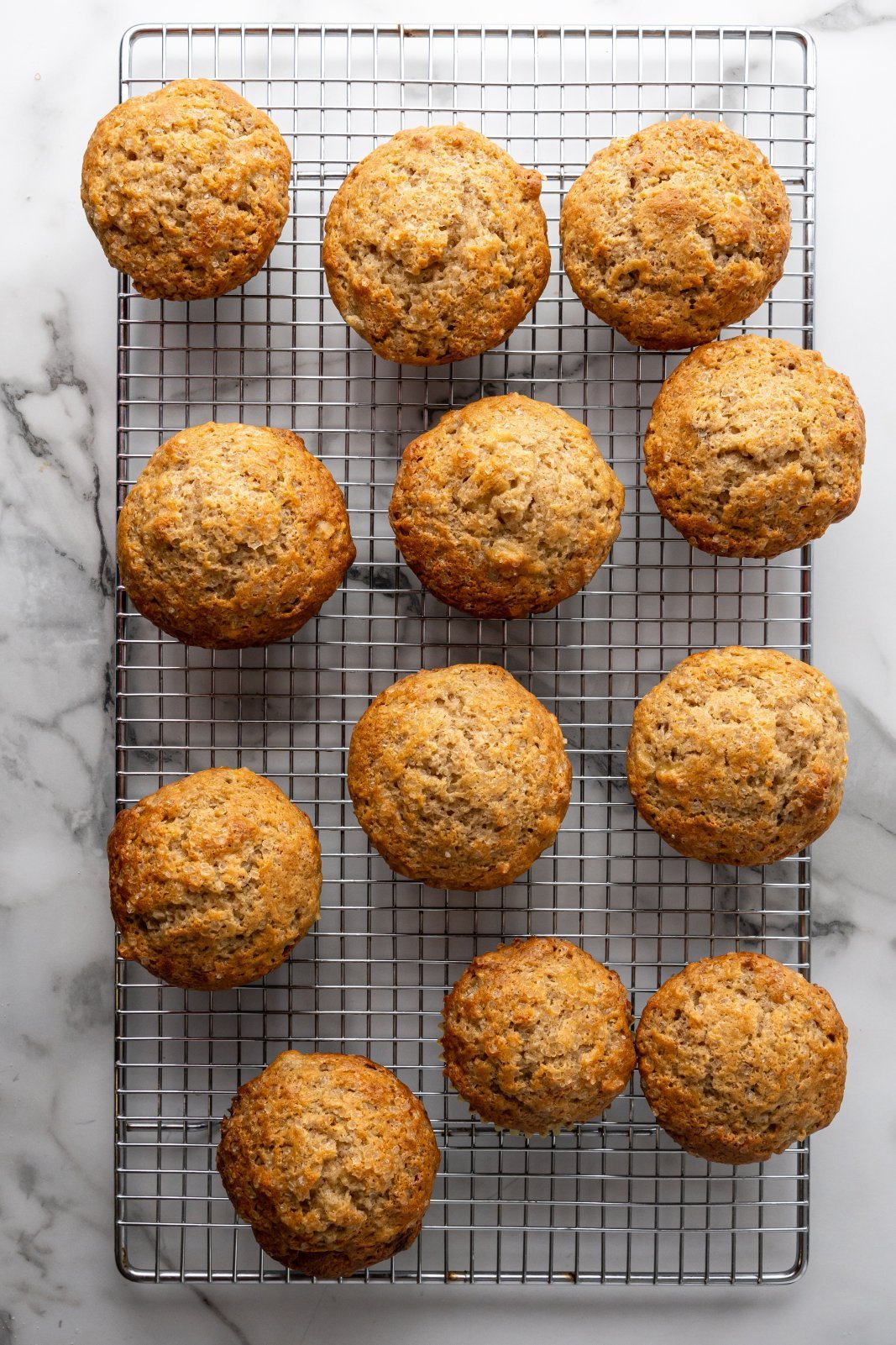 cooked muffins on a rack