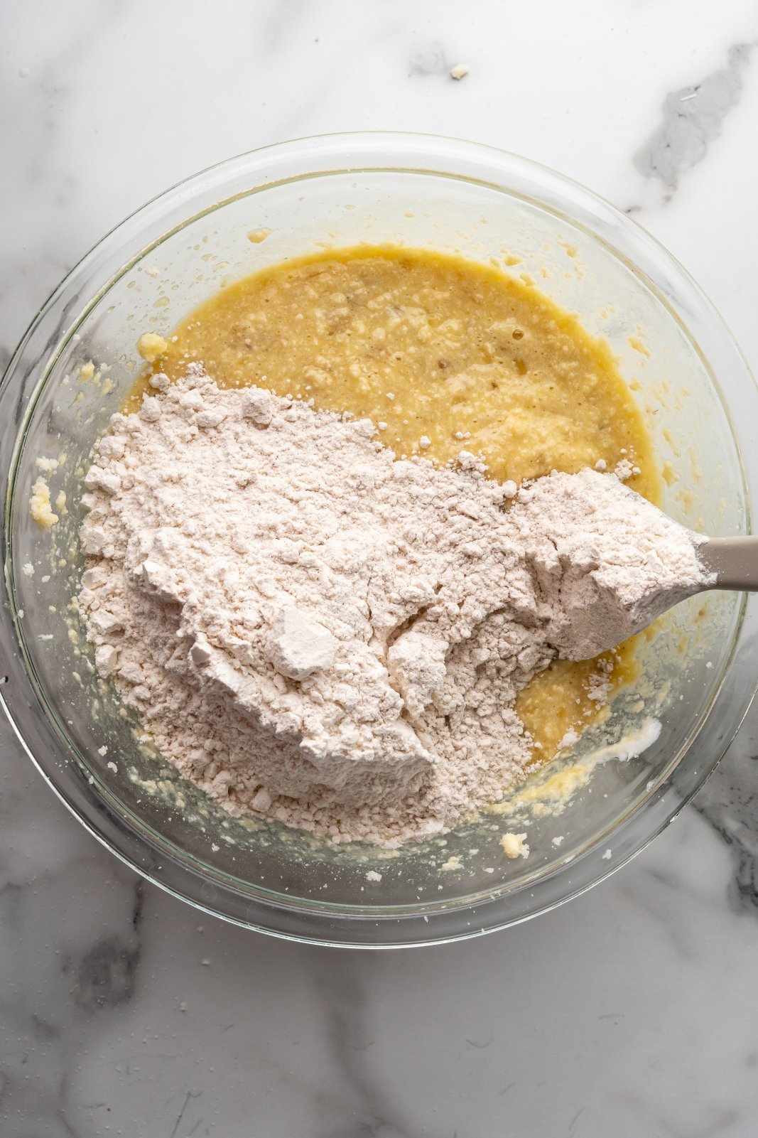 dry ingredients getting mixed into wet