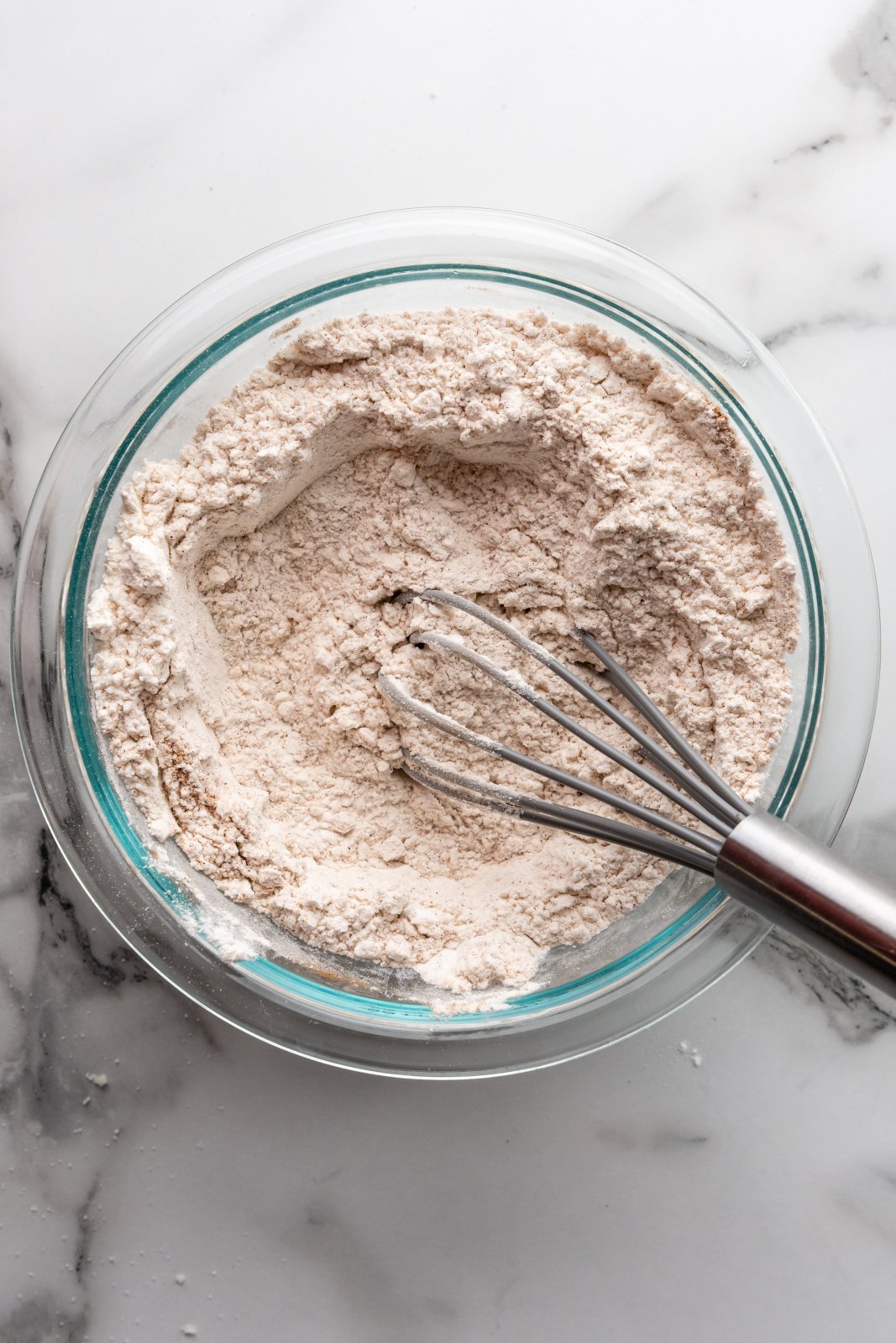 dry ingredients in a bowl with a whisk