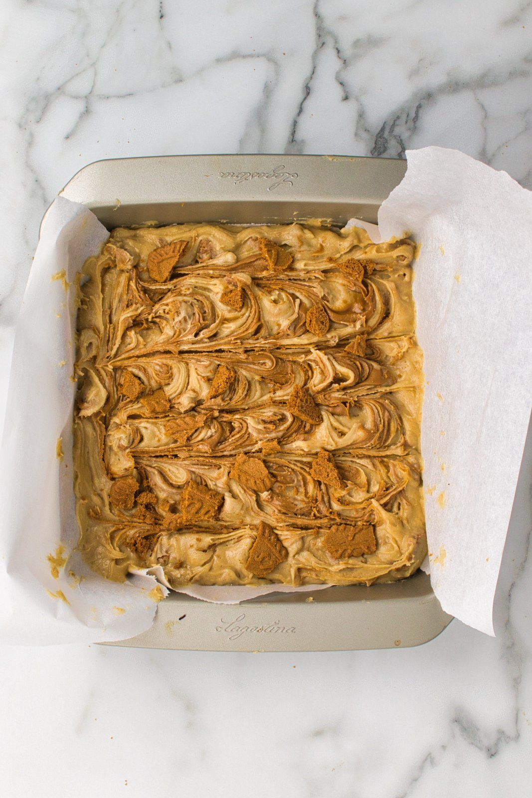 blondie batter in the pan before baking
