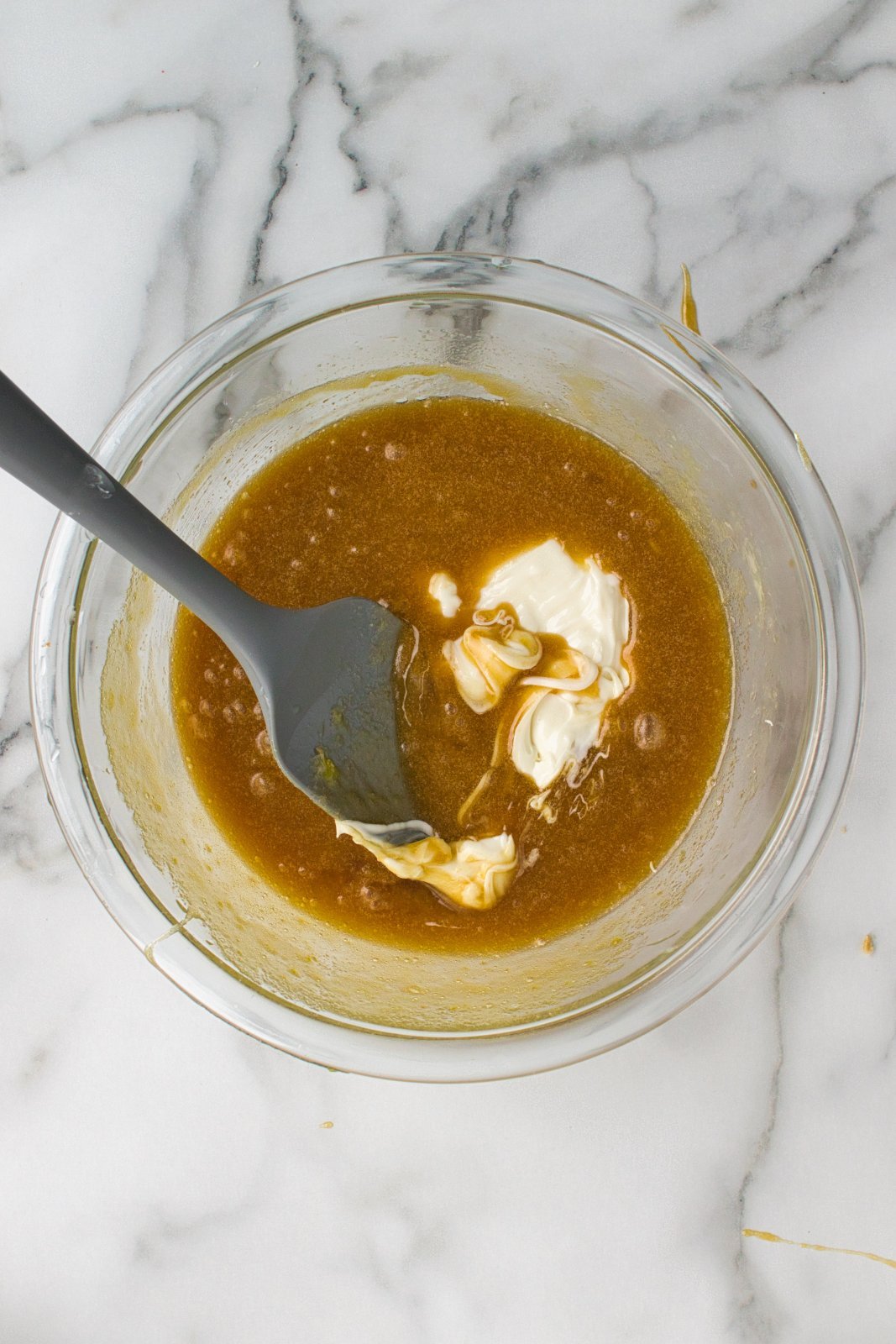 white chocolate being added to the batter