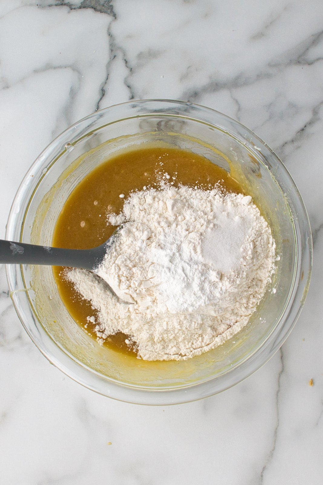 dry ingredients getting added to the wet ingredients