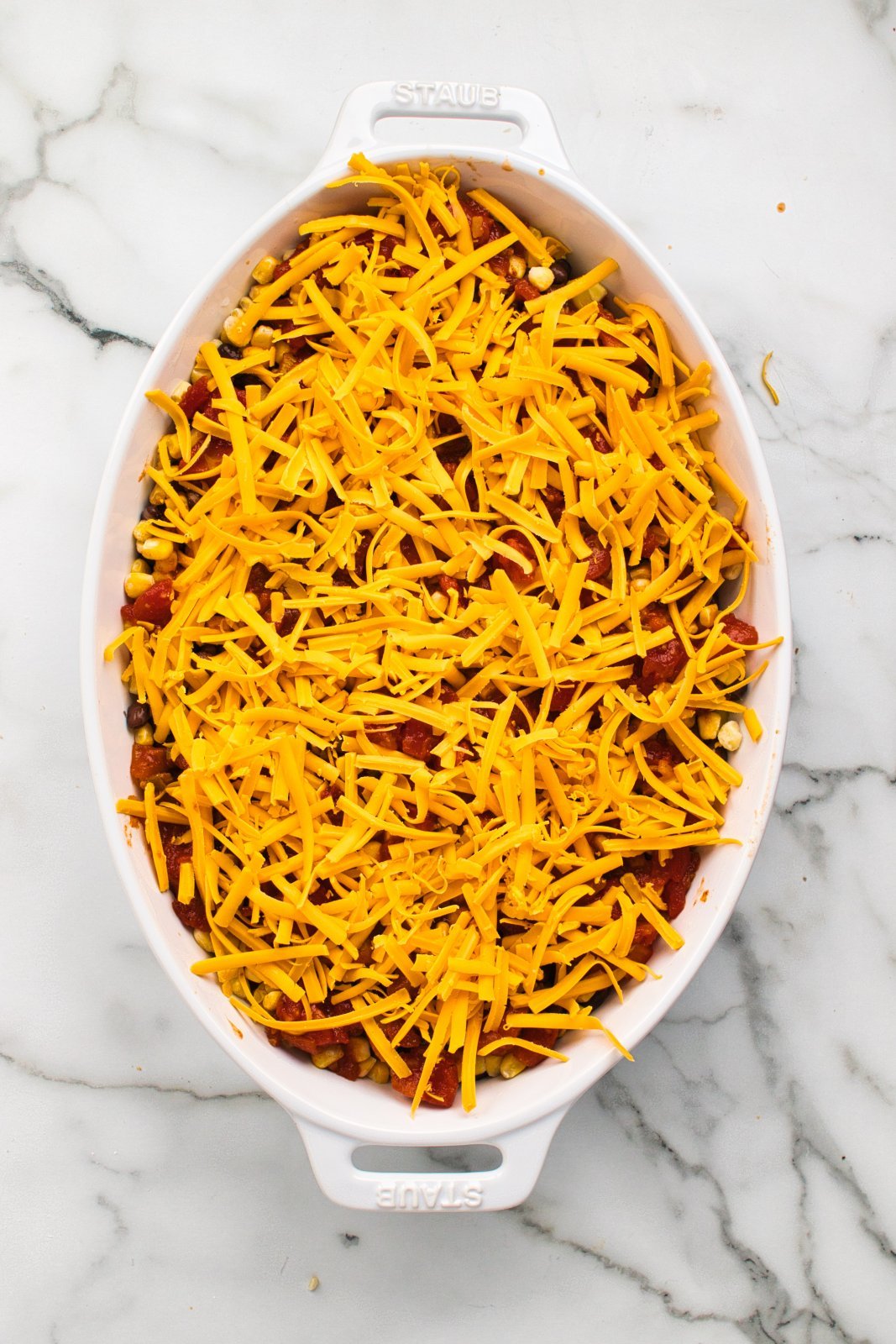 casserole dish with all the ingredients before baking