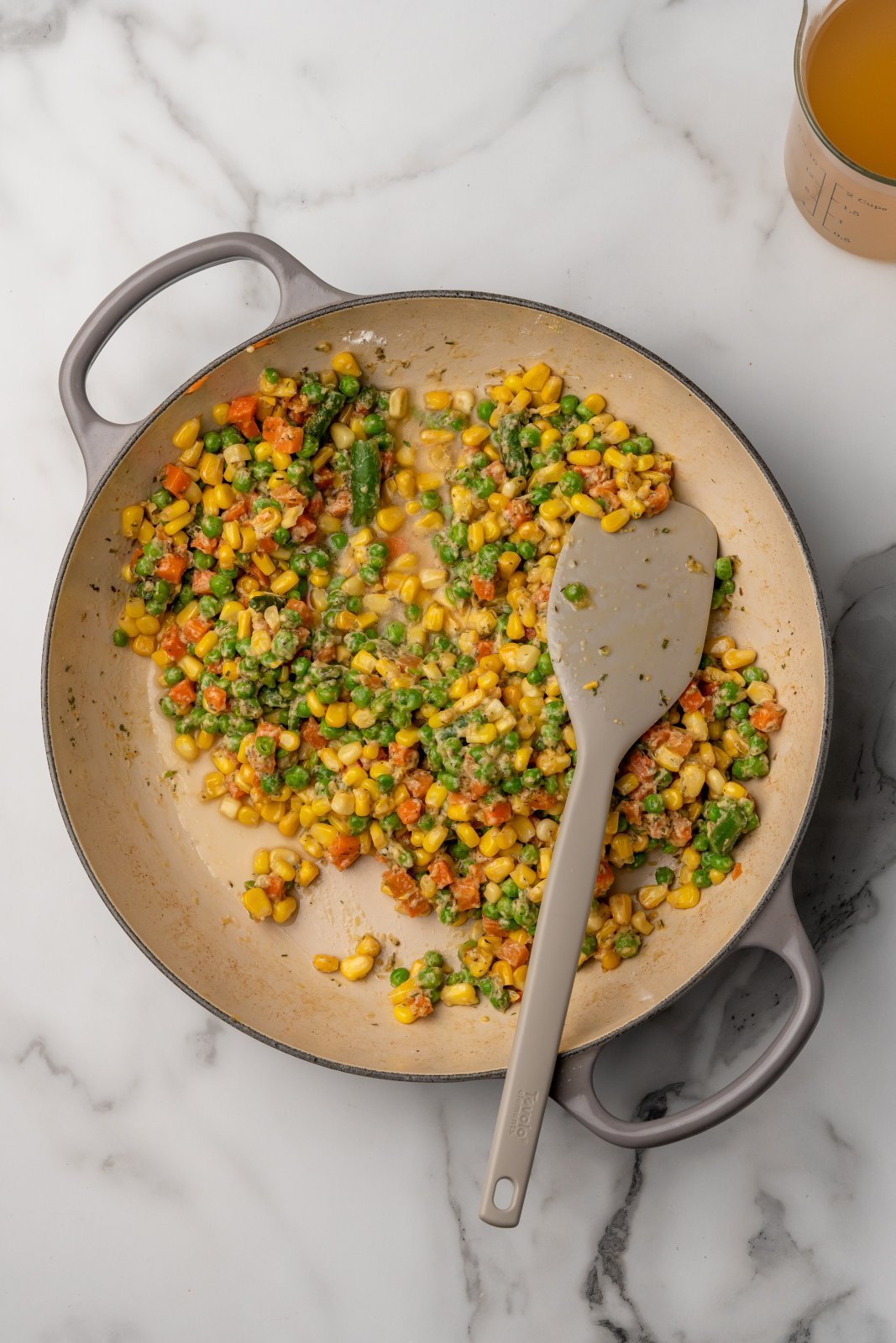 a little bit of broth added to the veggie mixture