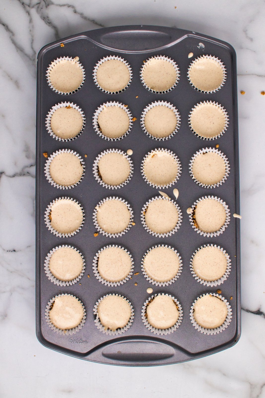 a tray of raw cheesecake bites