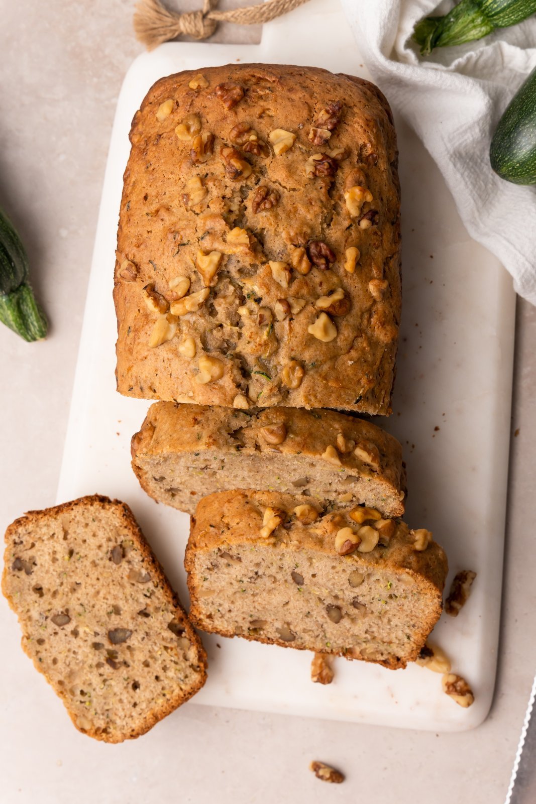 a top down view of a sliced loaf of zucchini bread