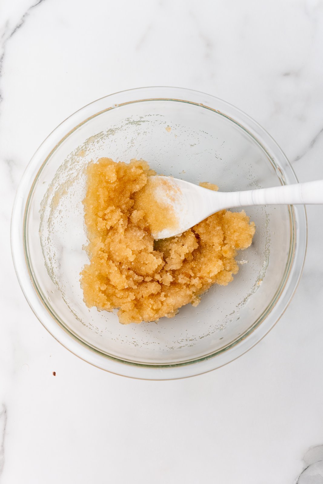 oil and sugars mixed in a bowl