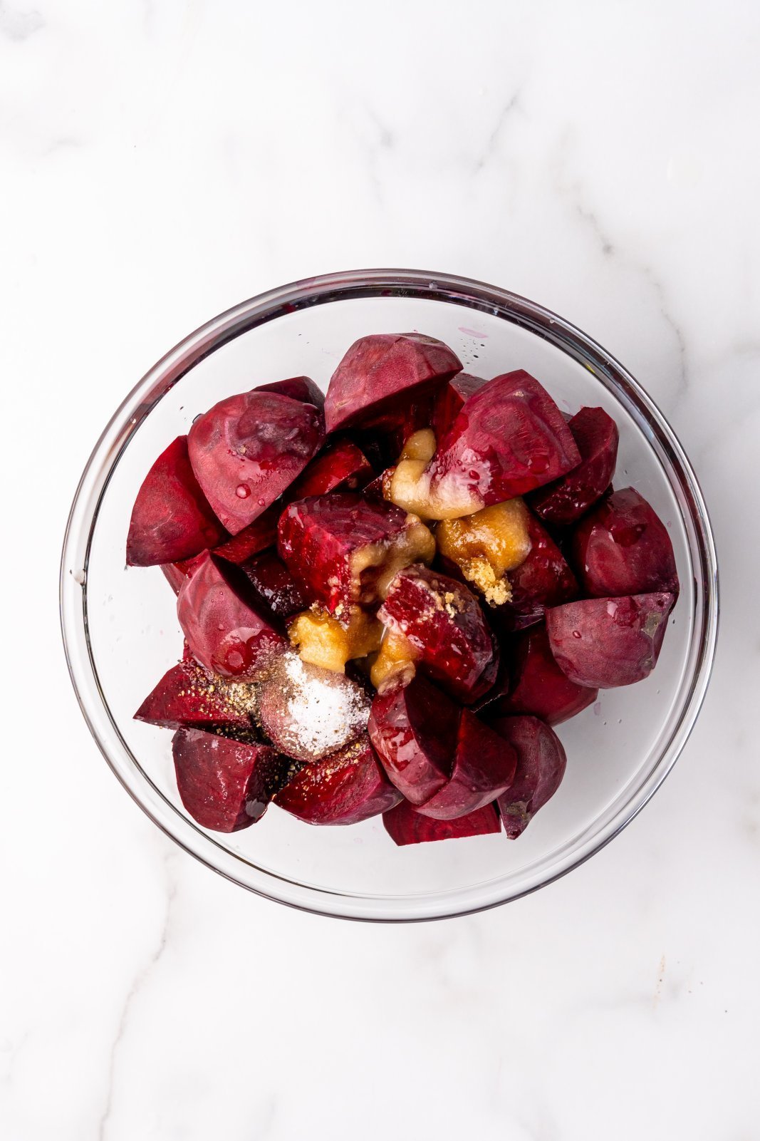 beets in a bowl with seasonings