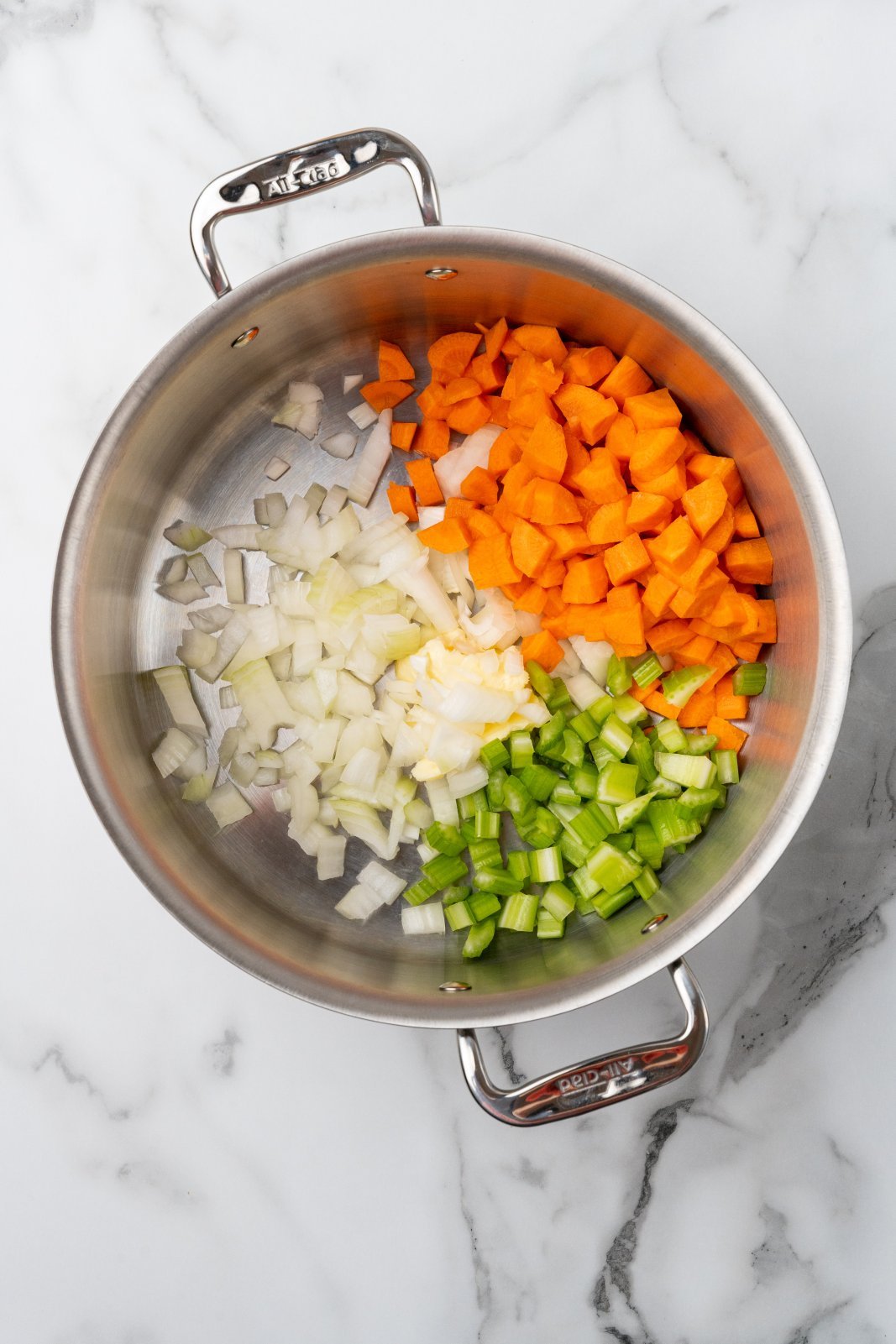 onion, carrot, and celery in a large stockpot