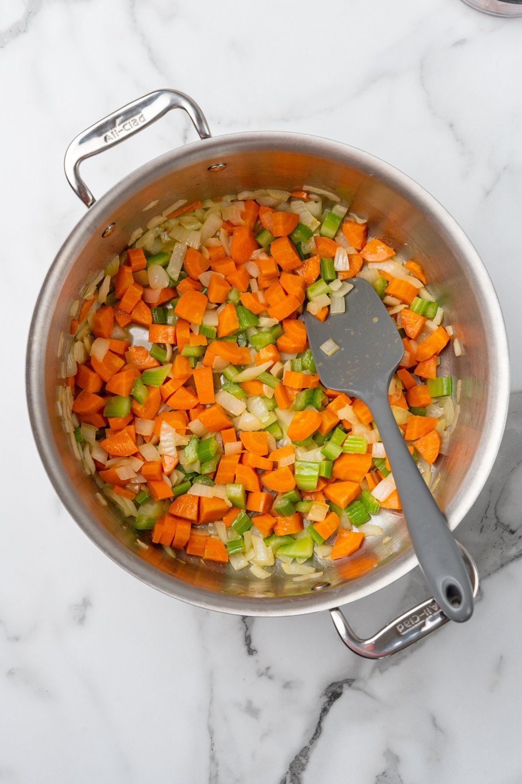 cooked onion, carrot, and celery in a large stockpot