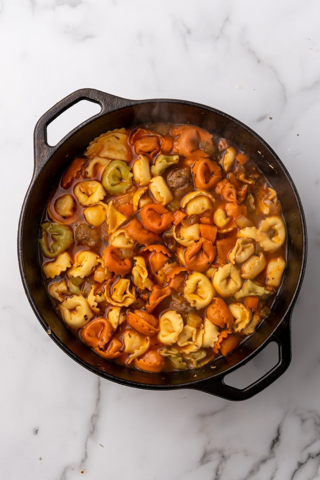 a view of the soup after tortellini have been cooked
