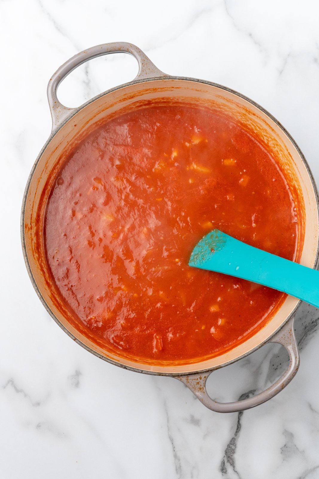 the soup after simmering in a large grey dutch oven