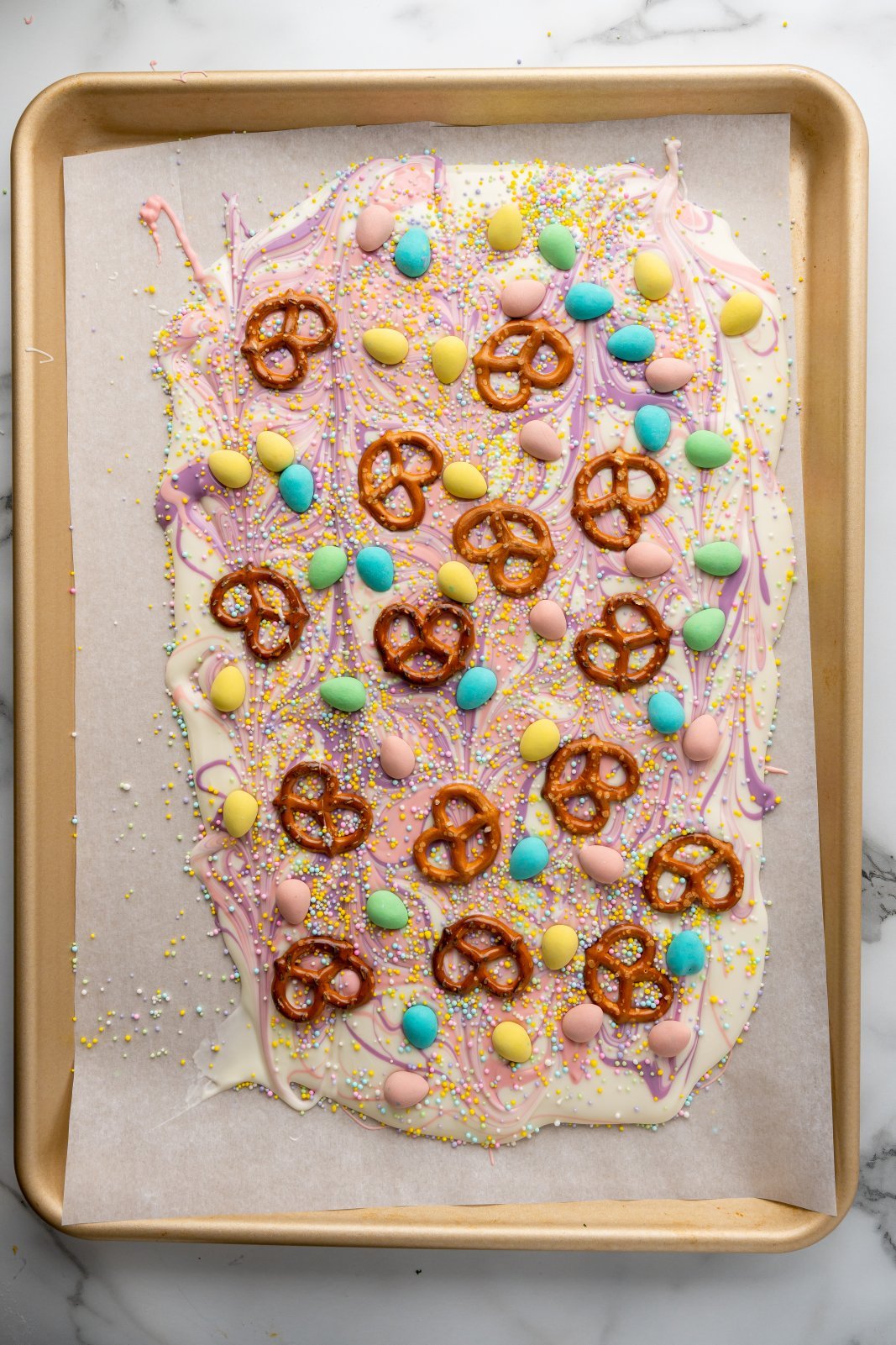 easter egg pretzel bark after candies and pretzels have been added