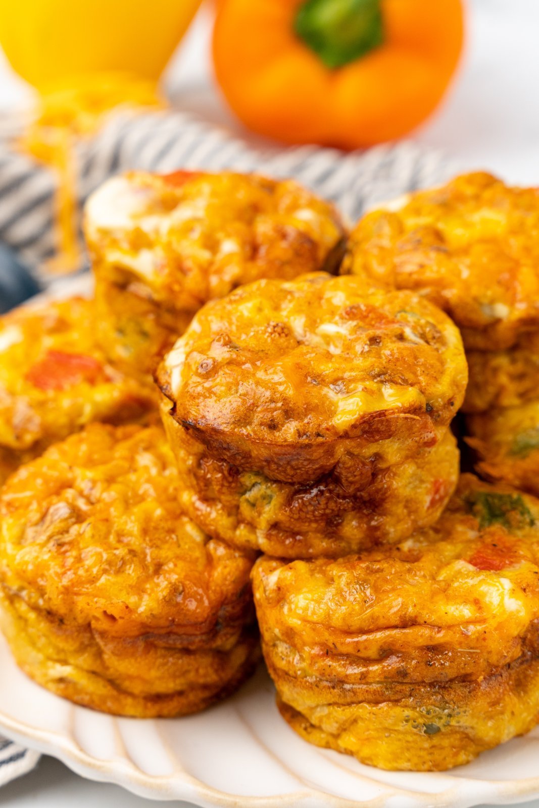 a plate of egg bites stacked