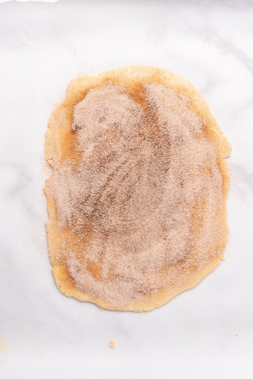 dough after the cinnamon sugar has been added