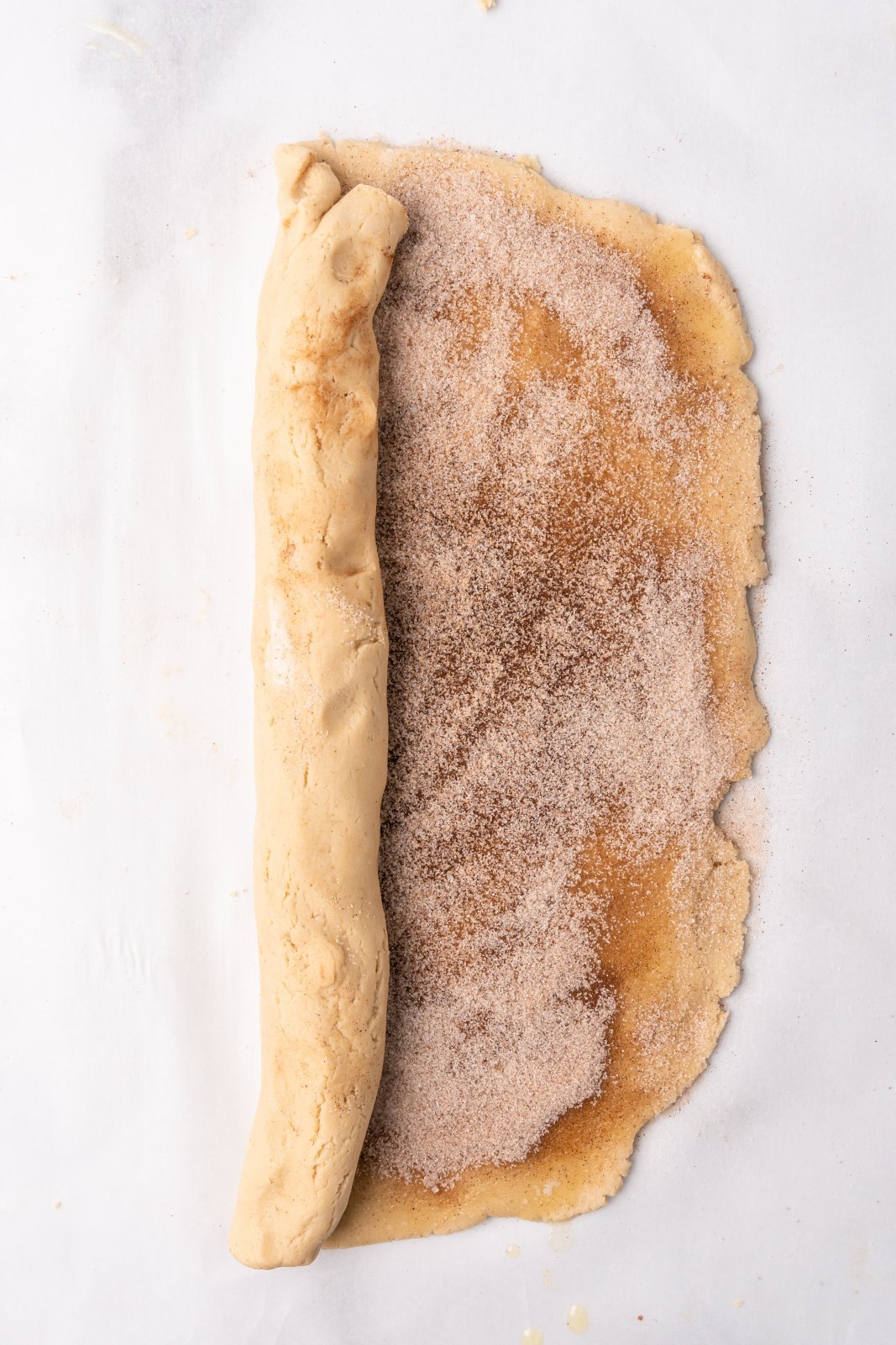 dough half rolled into a log