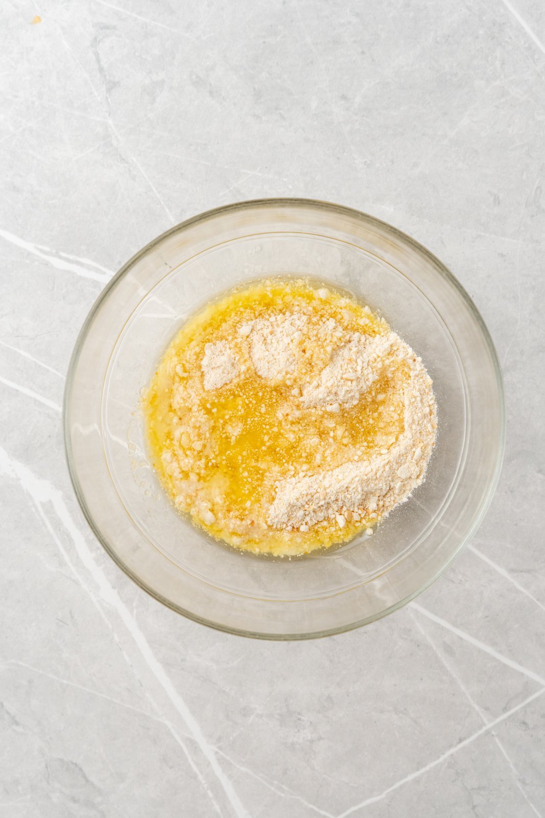 breadcrumbs and butter in a small dish