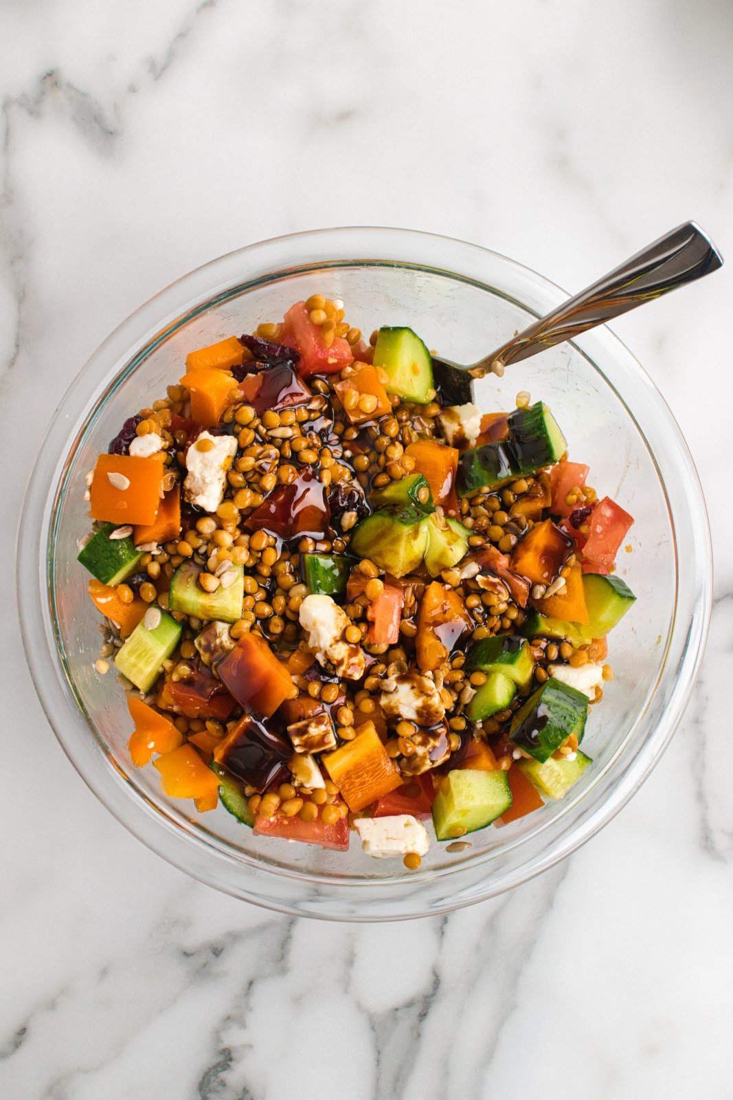 the dressing on top of the lentil feta salad
