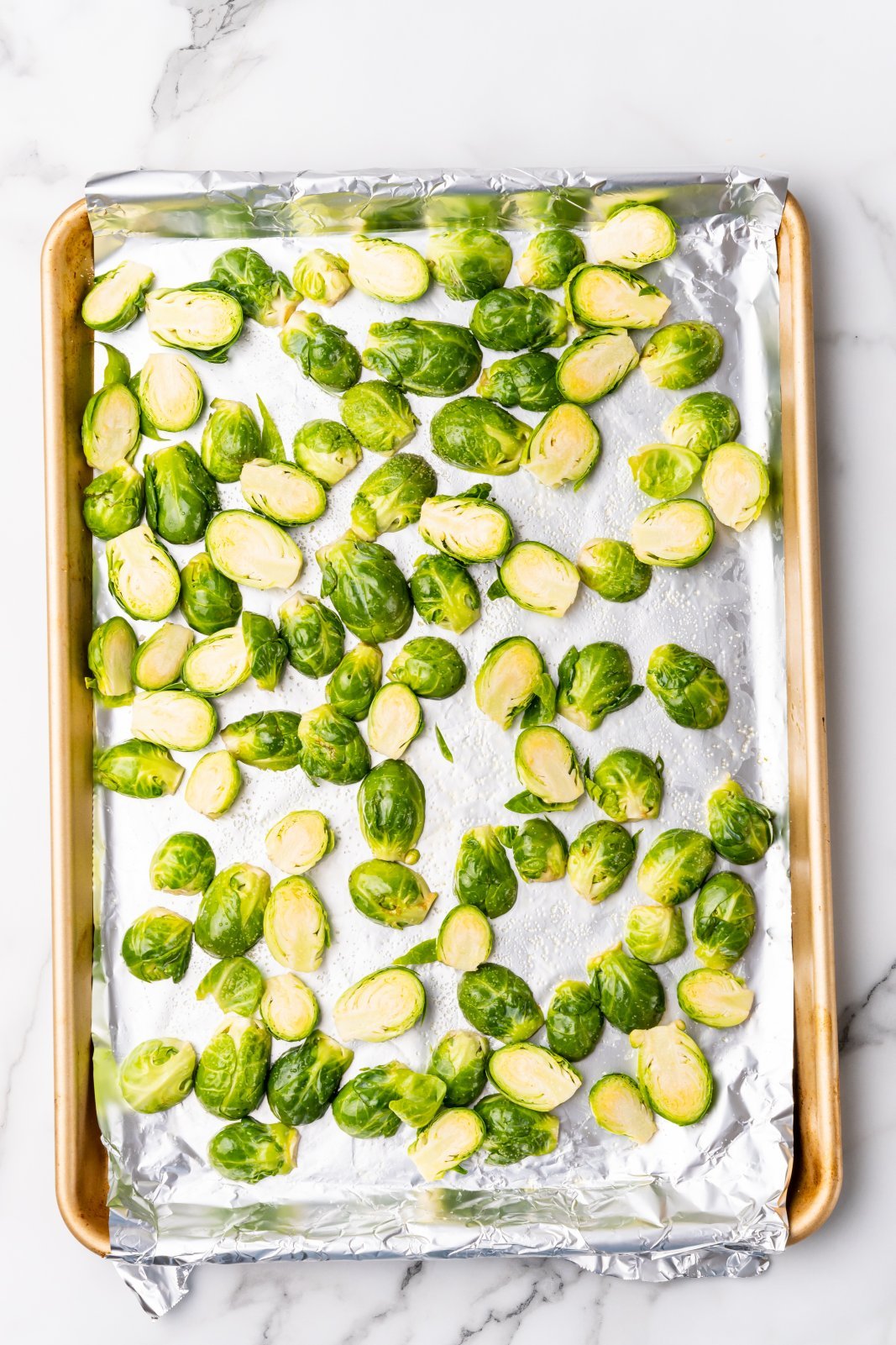 raw sprouts on a baking sheet