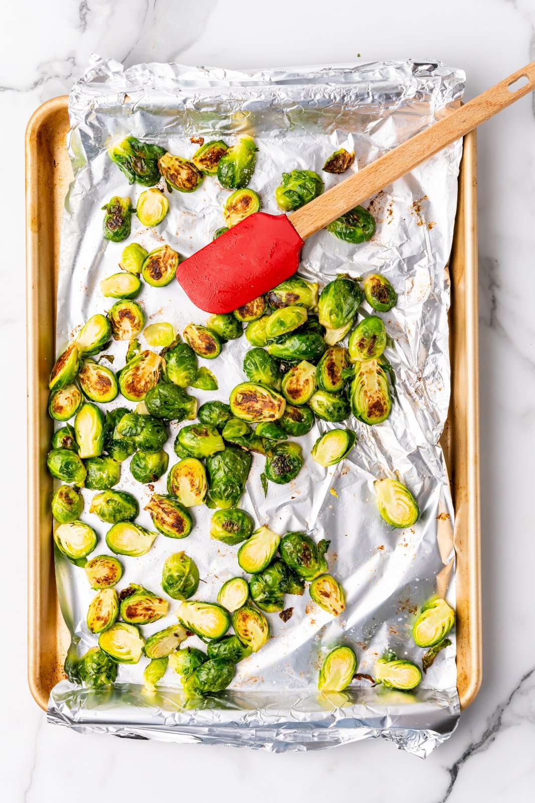 roasted sprouts on a baking sheet