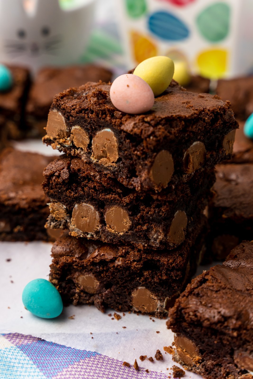 a stack of mini egg brownies is shown