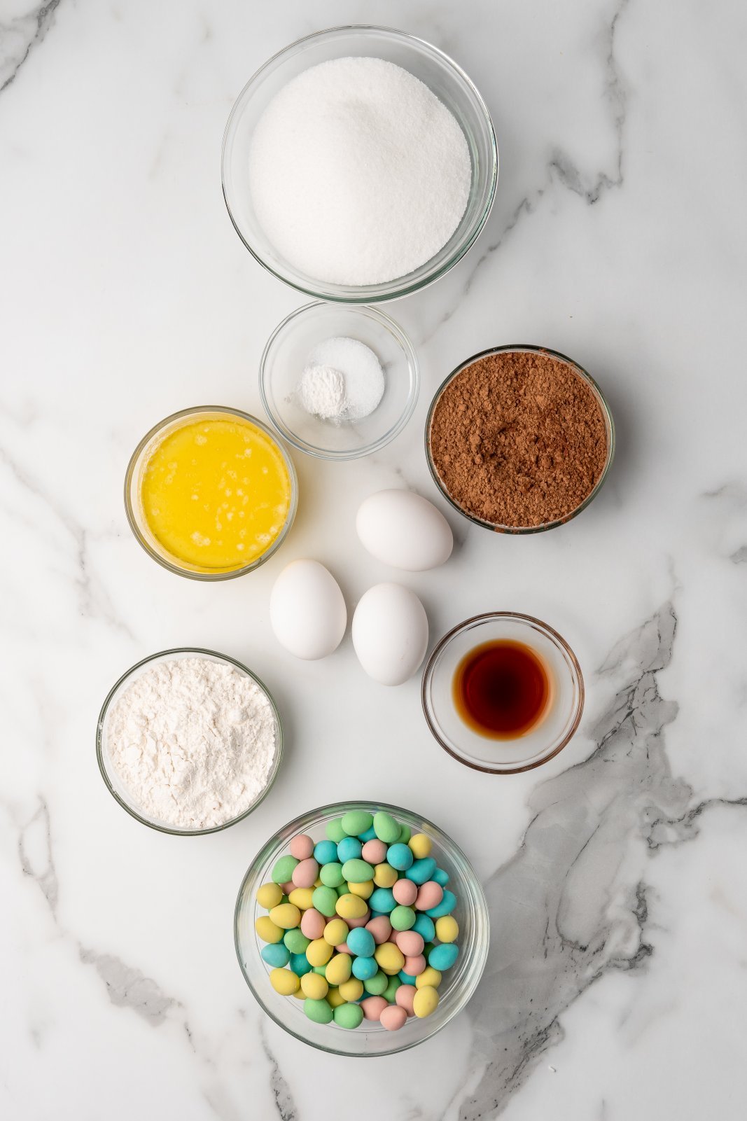 a top down view of the ingredients needed for mini egg brownies
