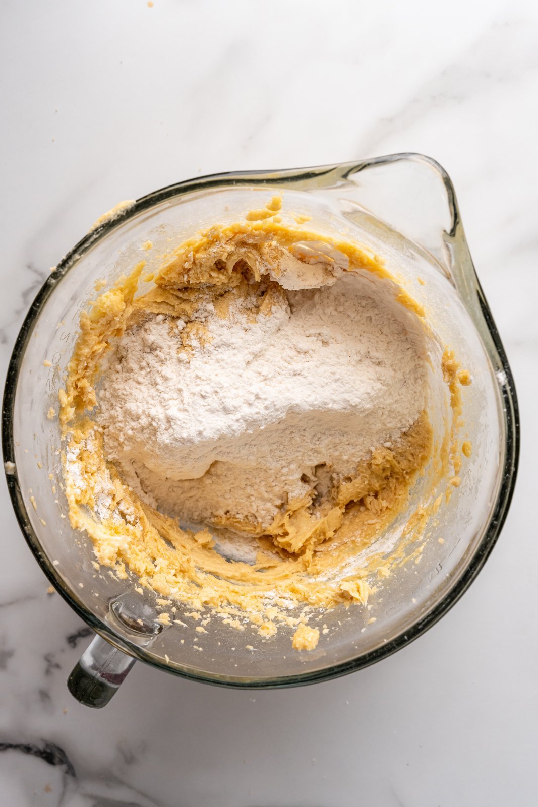 a bowl with flour waiting to get mixed into the butter