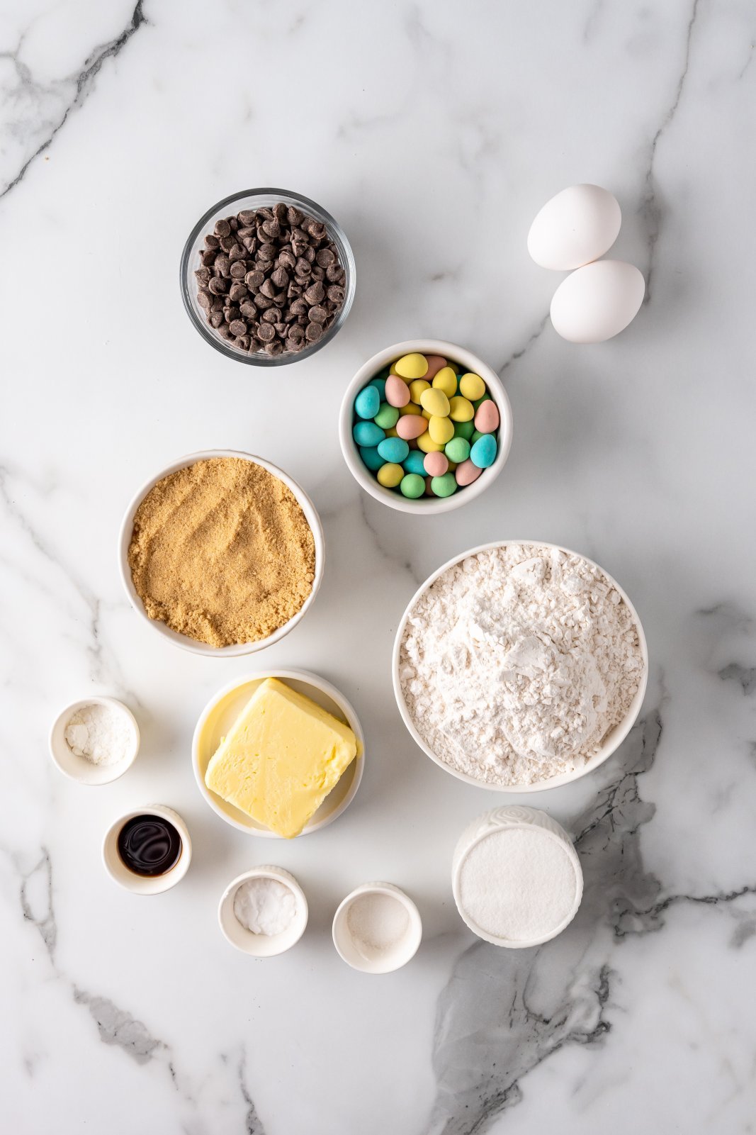 a top down view of the ingredients needed for mini egg cookie bars