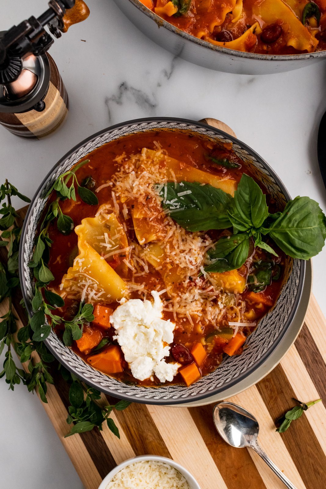 a bowl of vegetable lasagna soup