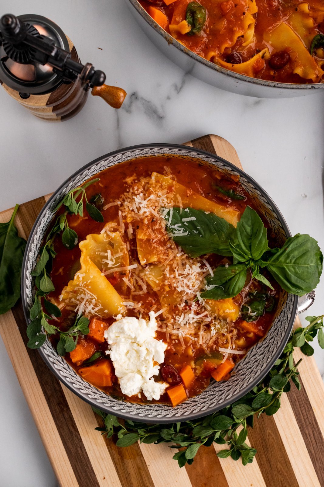 a big bowl of vegetable lasagna soup
