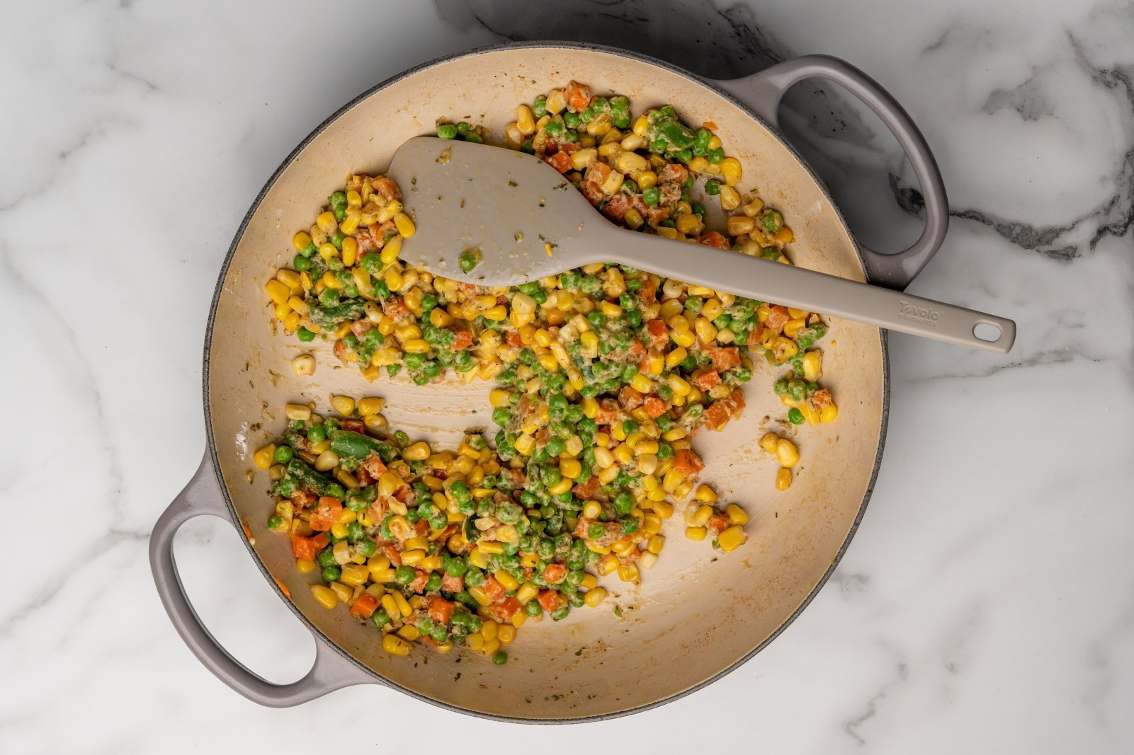 flour and seasonings mixed into the veggies