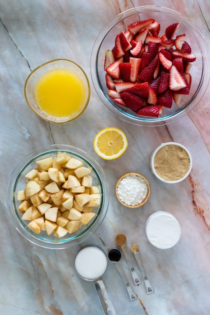 top down view of ingredients needed for apple and strawberry crumble