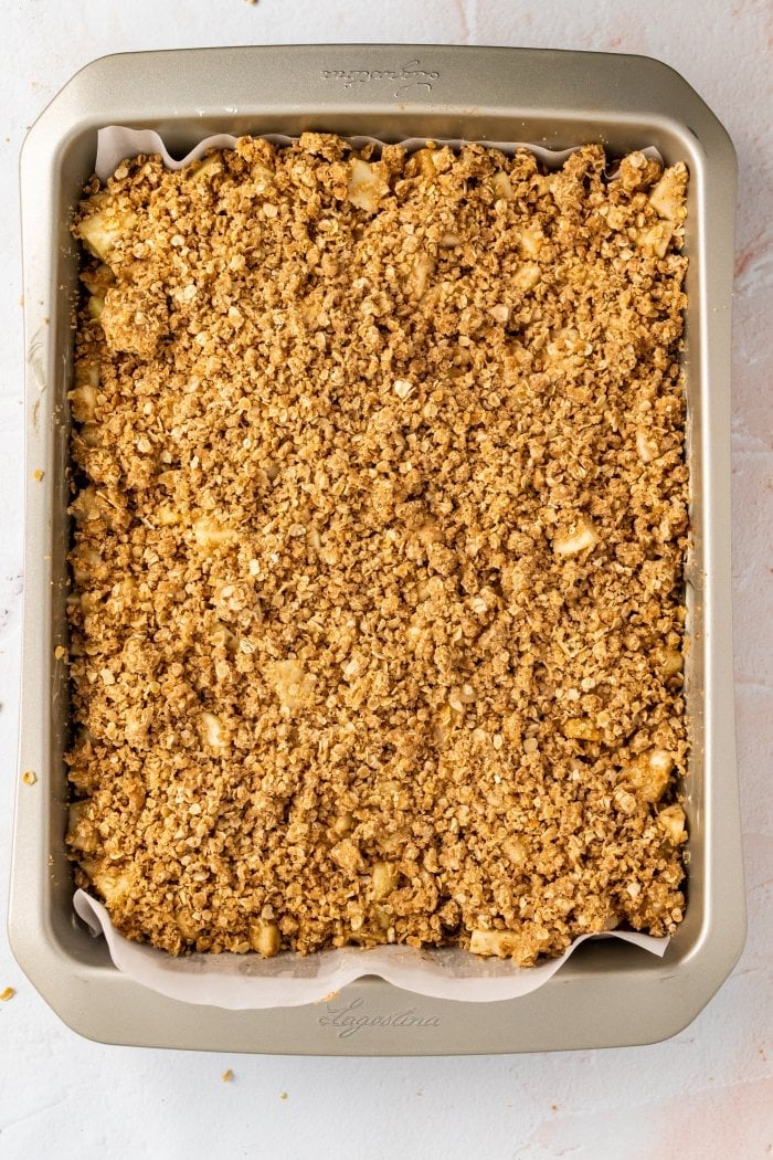 a top down view of apple crisp oat bars before baking