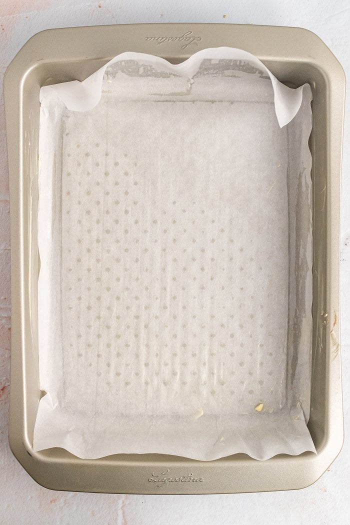 a top down view of a pan lined with parchment