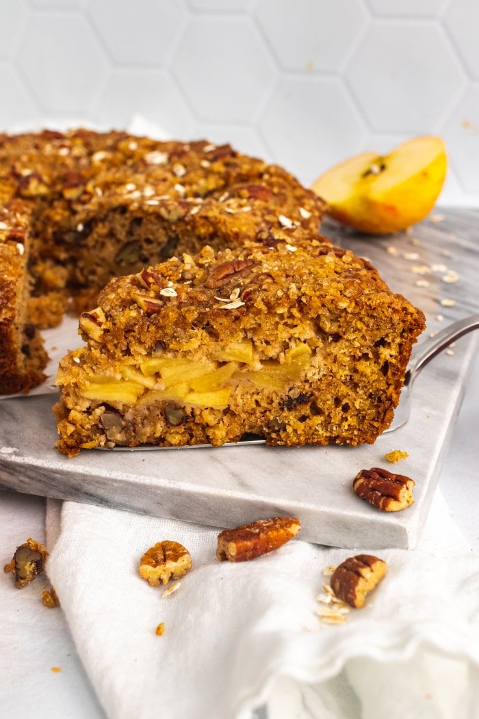 a slice of apple oatmeal cake is shown