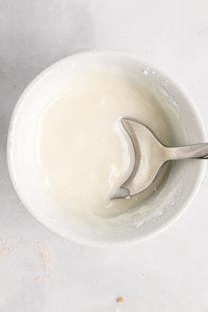 a bowl with a shiny sugar glaze